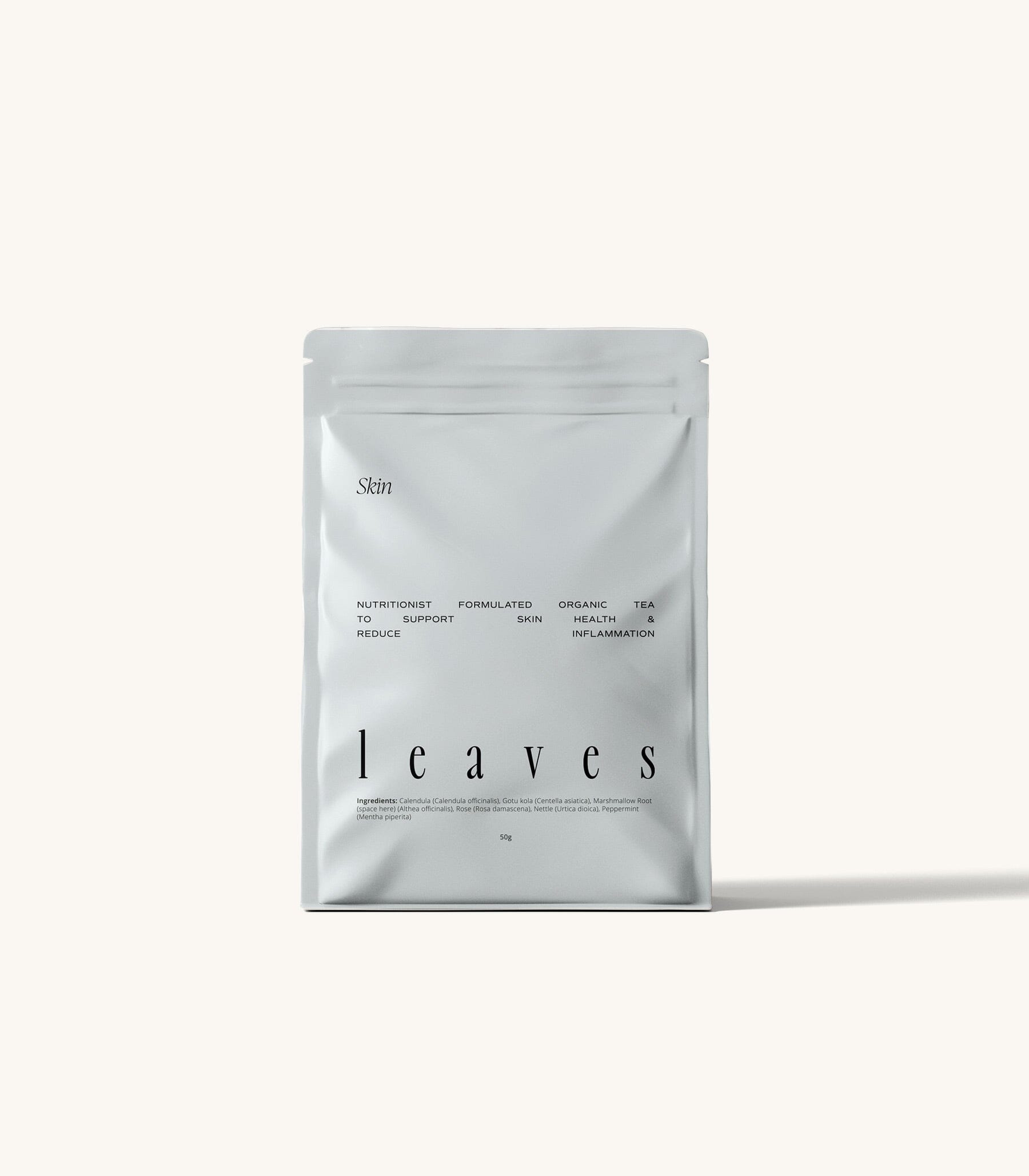 Skin leaves tea pouch standing on a cream background